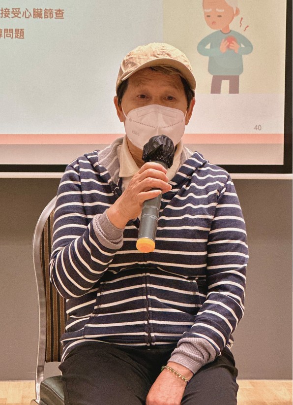 基層心臟病患者譚女士分享在暖心行動篩查活動中驗出尖瓣倒流及高膽固醇問題，獲轉介至心臟專科跟進。